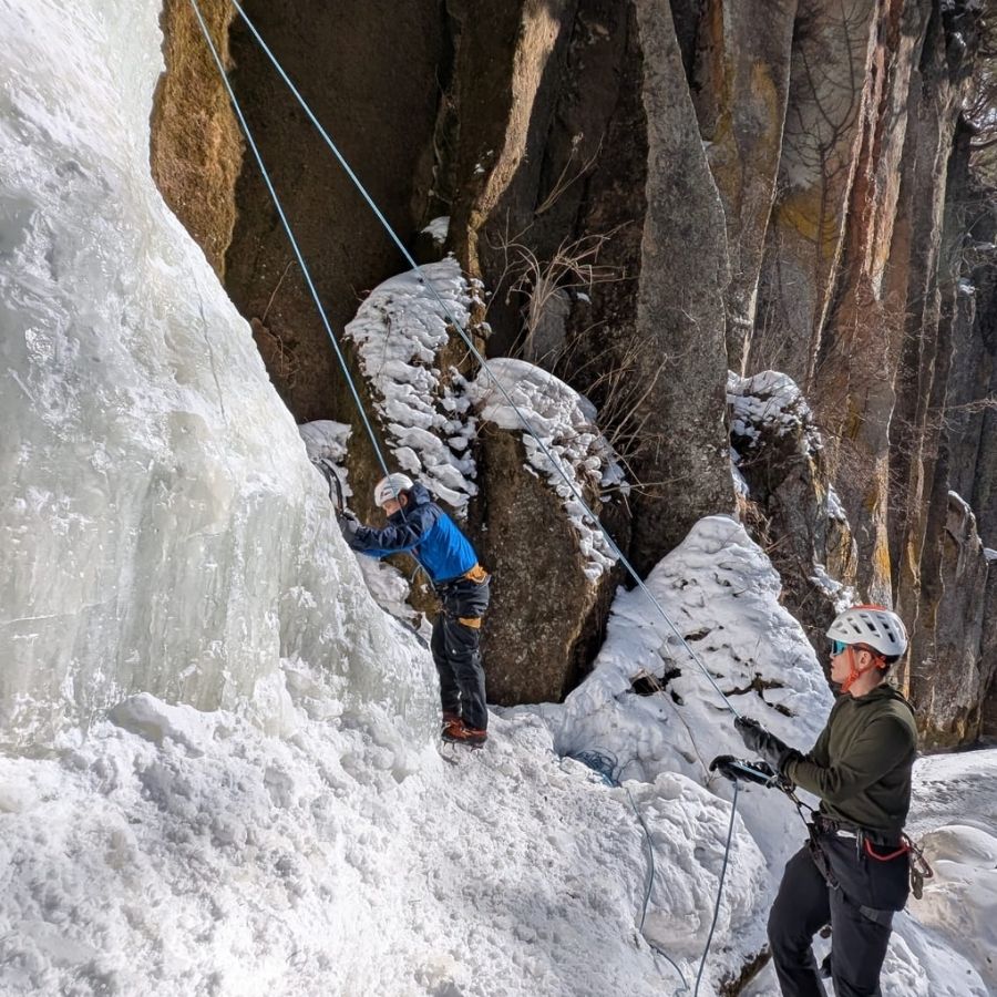 putting ice climbing skills into practice on frozen waterfall Hokkaido