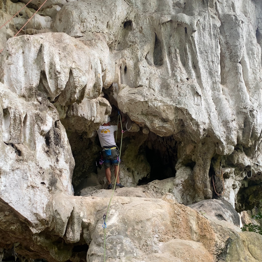 Byrdie preparing to climb Carrie On, The North Wall, Krabi