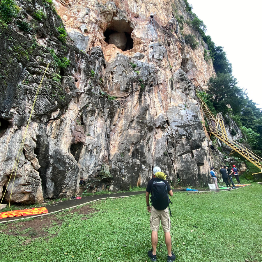 Climber getting ready at Gua Damai climbing site