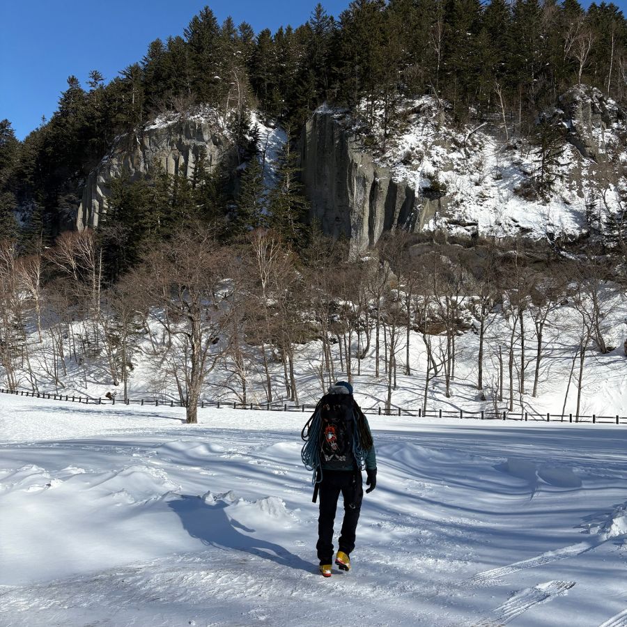 starting winter hike toward frozen waterfall climbing area Hokkaido