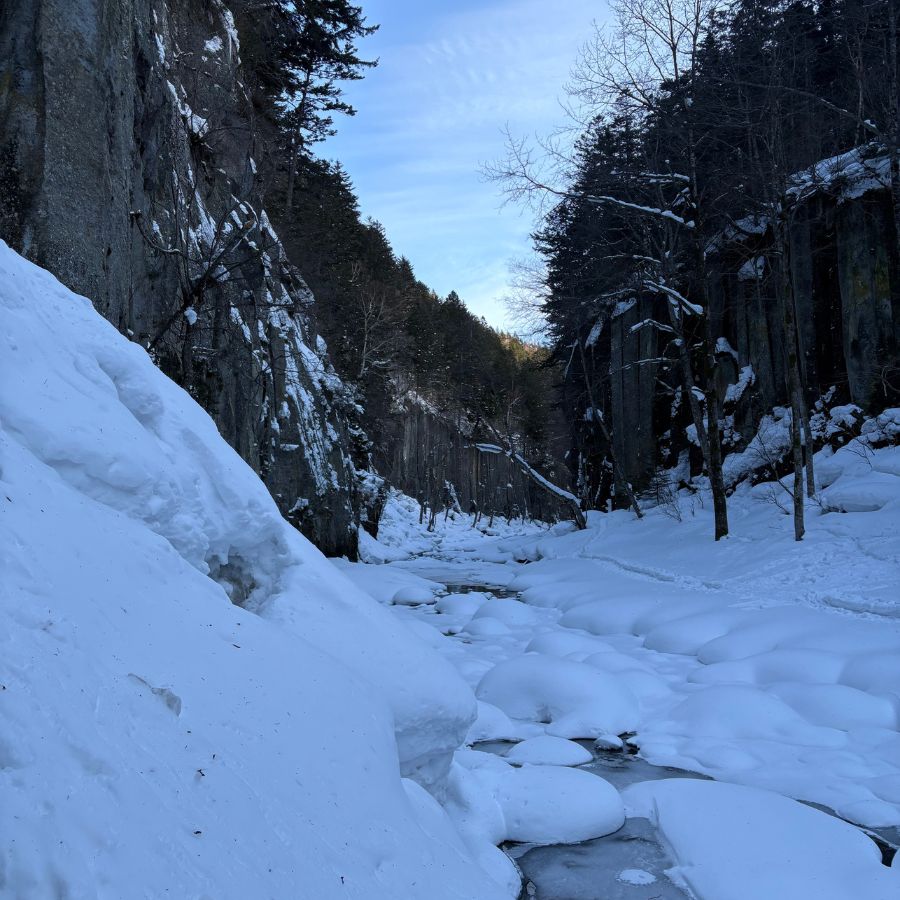 snowy valley landscape in Hokkaido winter mountains