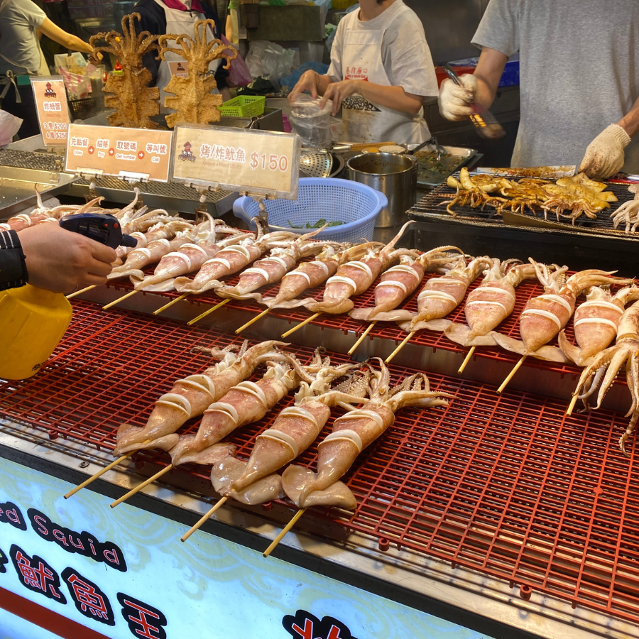 Fresh squid on display at Keelung night market seafood stall
