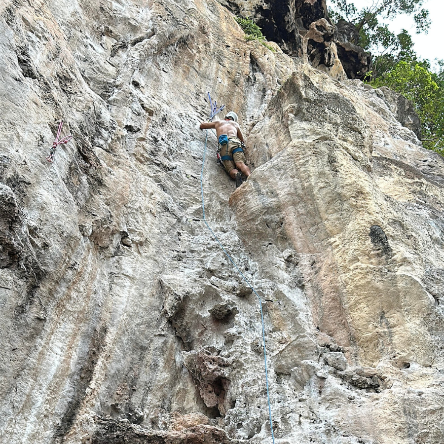 ByrdieOnTheRocks sending the King Cobra route at Railay Beach, conquering one of the toughest climbing challenges