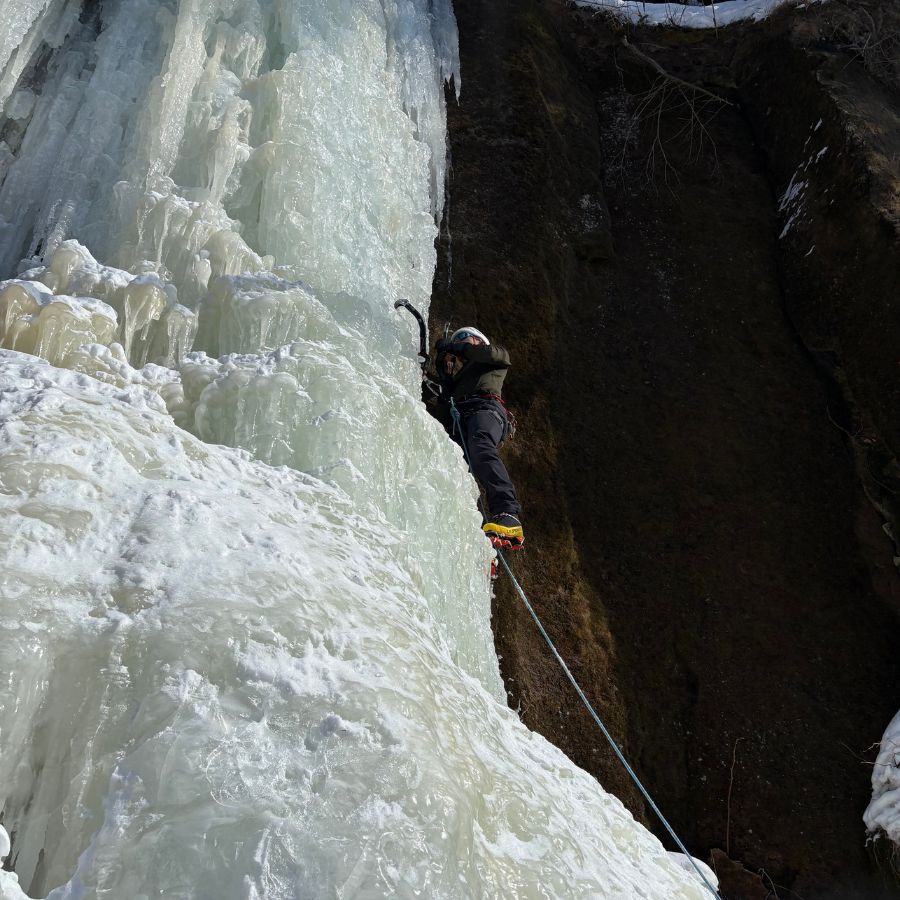 using ice axe together with crampons for ice climbing technique