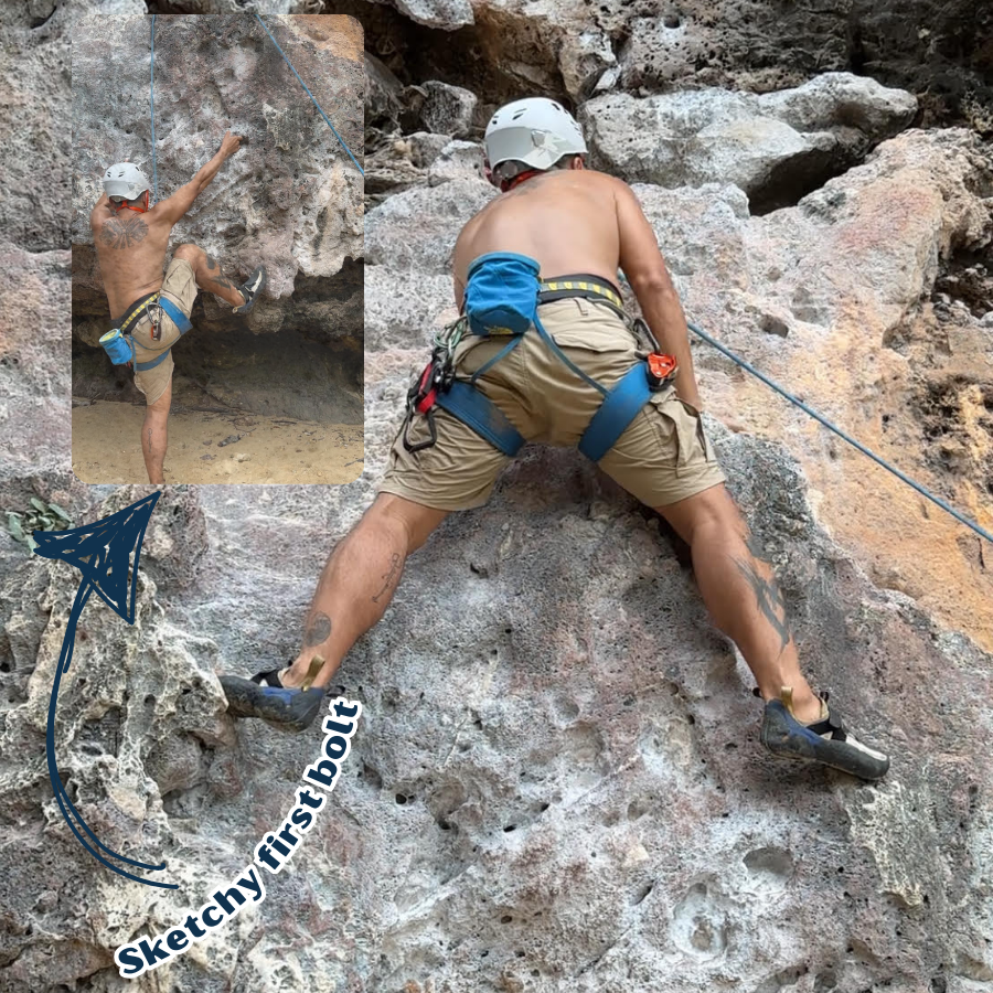 Climber facing a sketchy first bolt on the Ling Noi route at Railay Beach, Thailand, preparing for a challenging start.