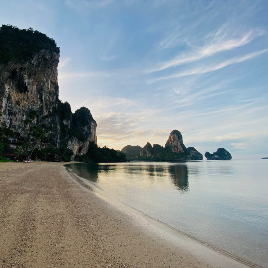 Scenic view of Railay Beach in Krabi, Thailand, with clear sunset skies