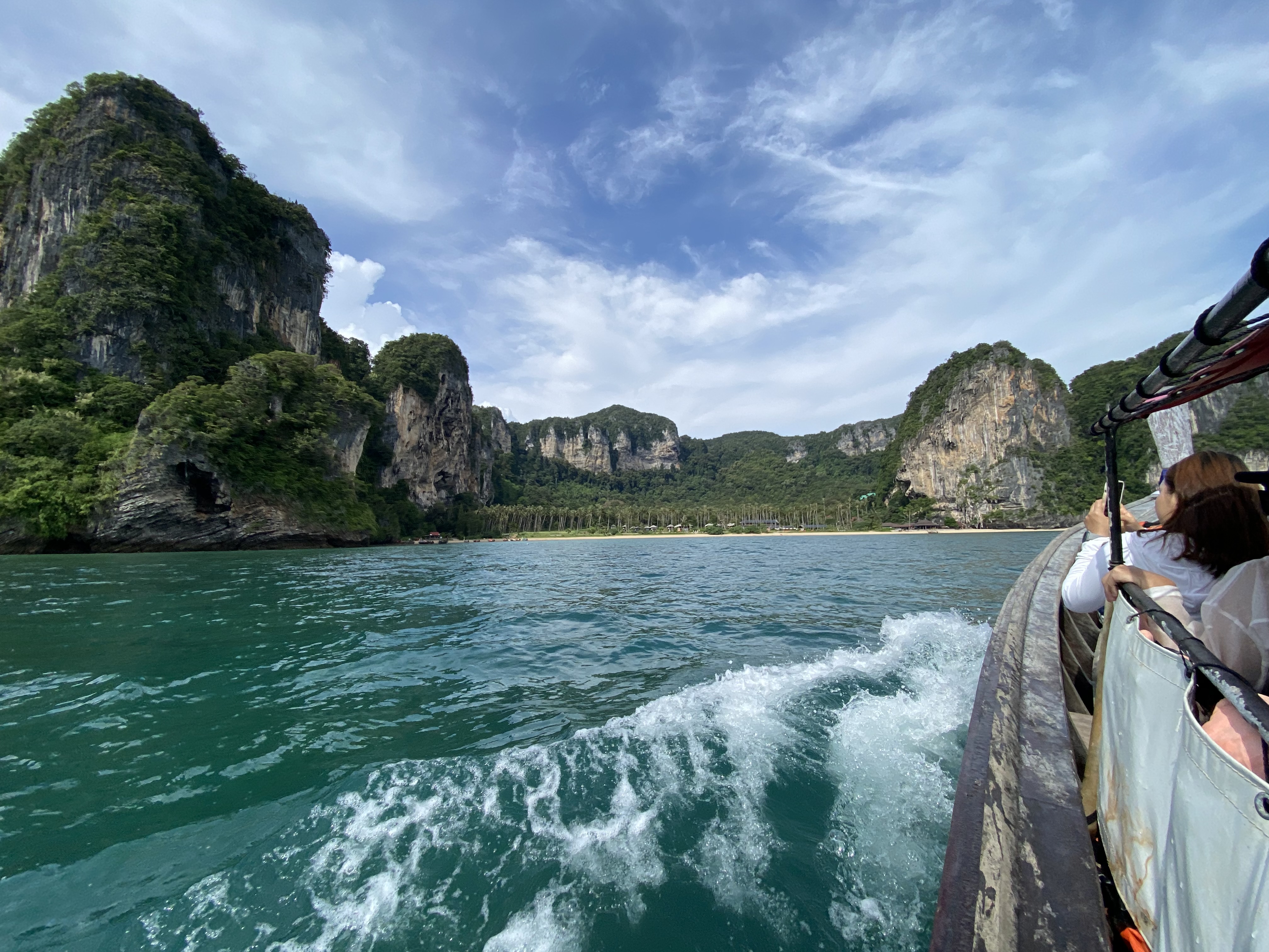 Scenic boat ride to Railay Beach, Krabi, with views of the coastline and clear blue waters